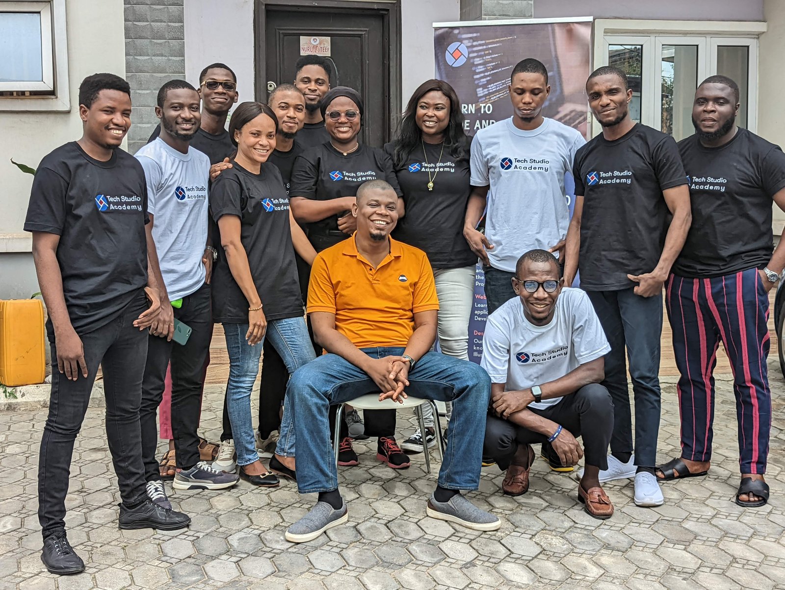 The Tech Studio Academy team outside the academy